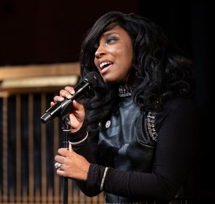 Imani performing